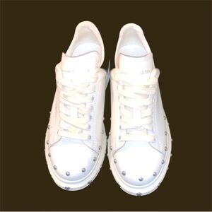 Alexander McQueen White Sneakers with Silver Studs.